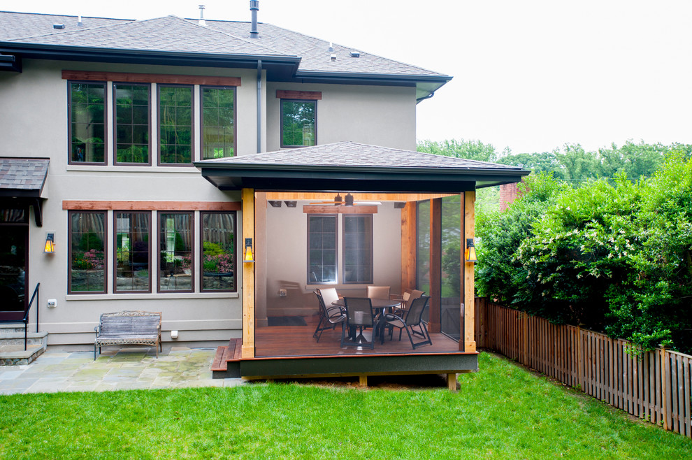 Inspiration for a small contemporary back screened veranda in DC Metro with decking.