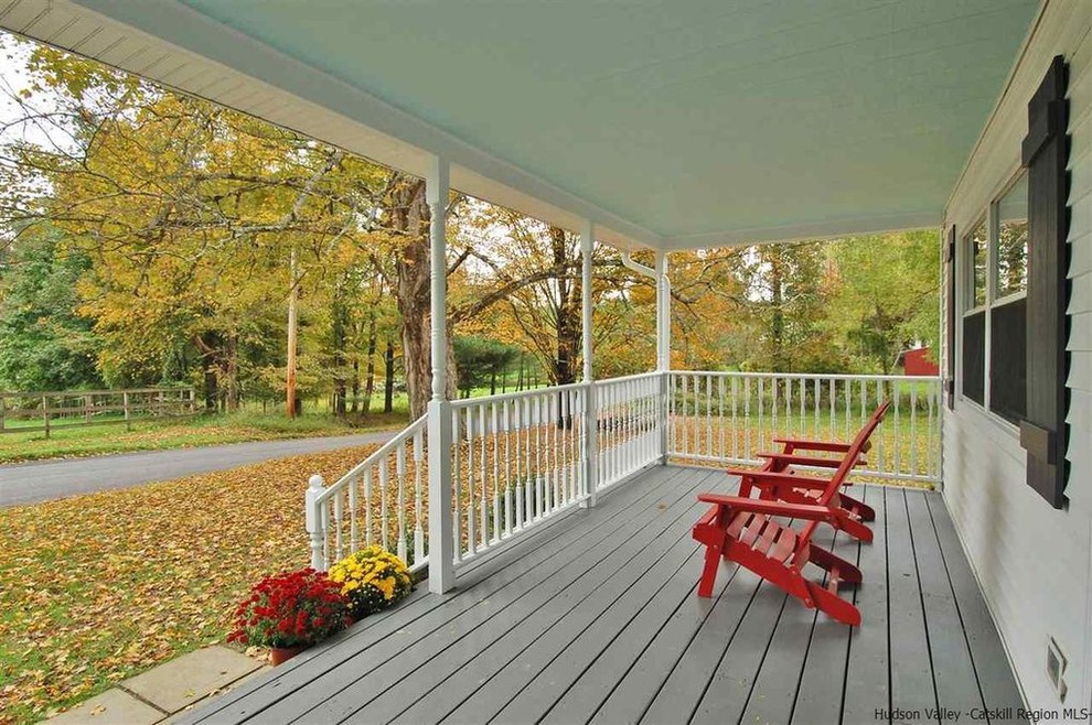 Photo of a farmhouse veranda in New York.