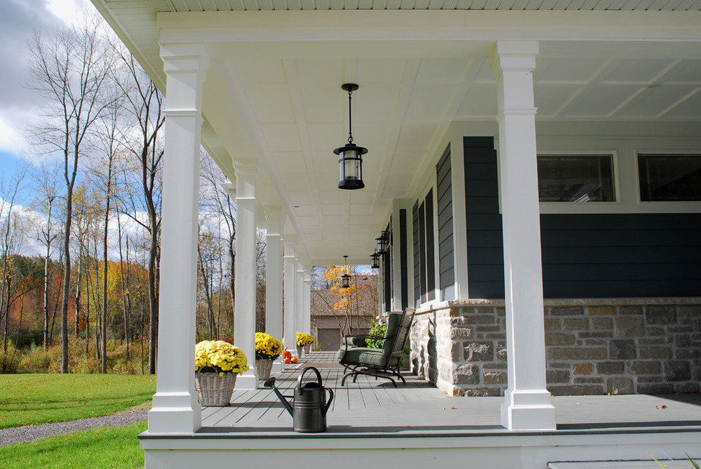 Inspiration for a timeless porch remodel in Ottawa with decking and a roof extension