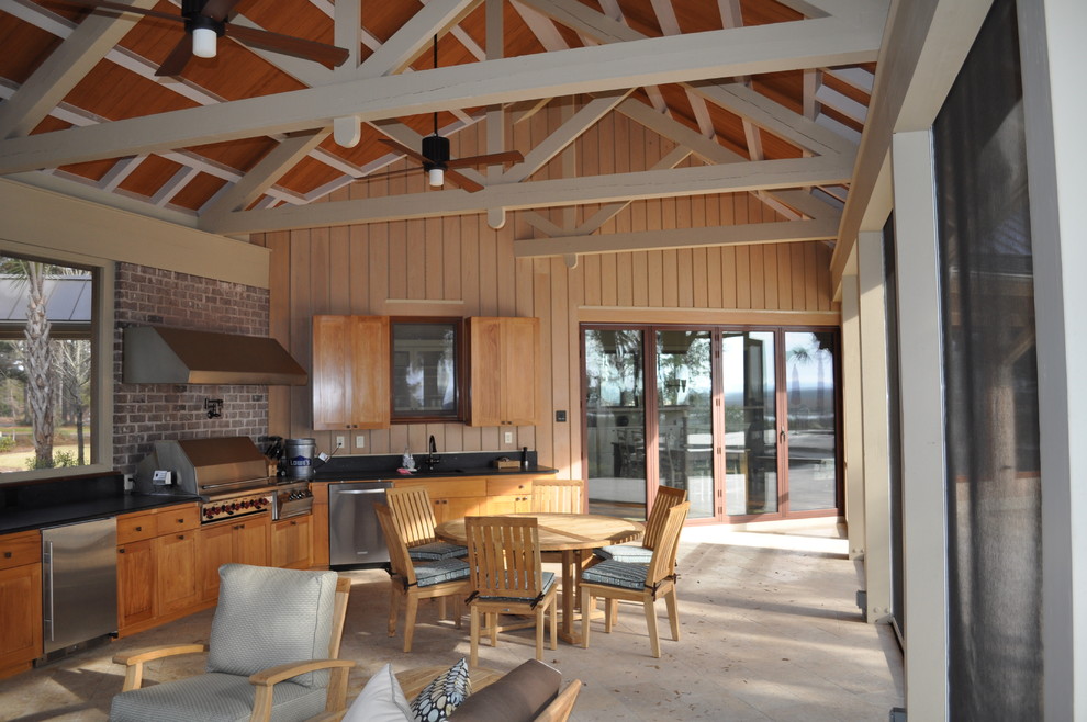 This is an example of a contemporary veranda in Atlanta with a roof extension and a bbq area.