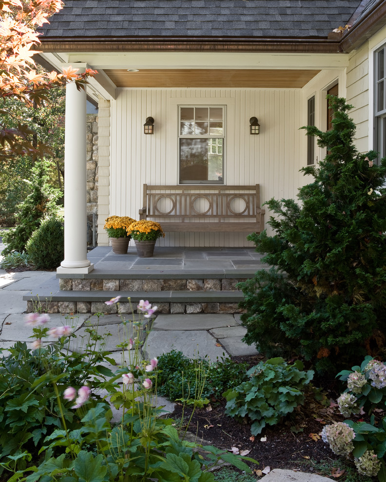 Elegant porch photo in Boston with a roof extension