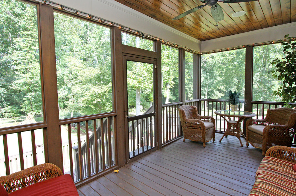 Mid-sized elegant back porch photo in Atlanta with decking and a roof extension