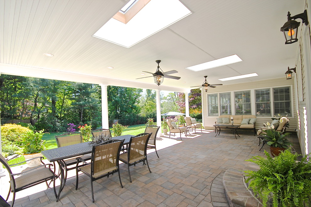 Example of an island style patio design in New York