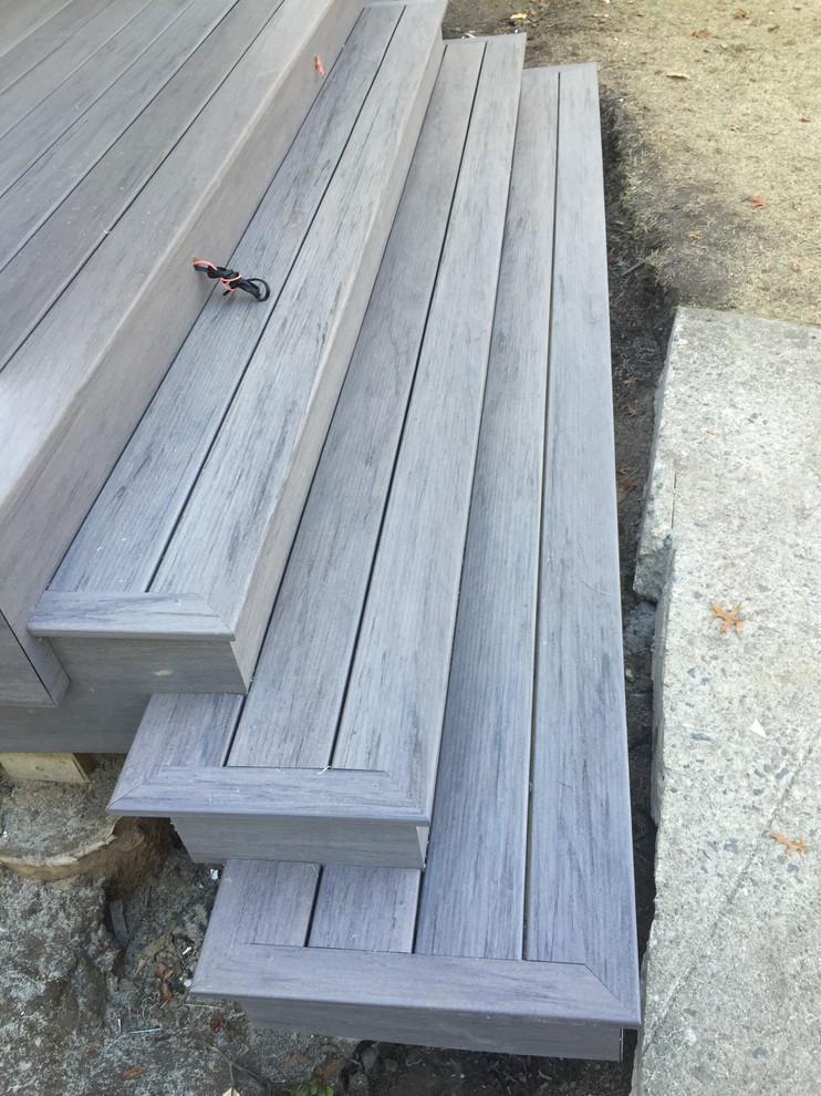 Mid-sized classic front porch idea in New York with decking