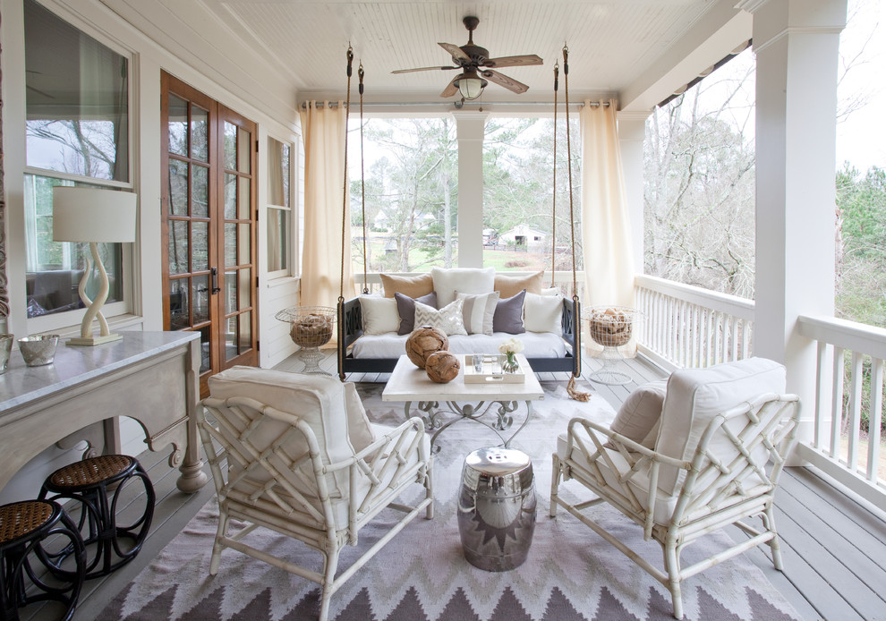 Inspiration for a large timeless back porch remodel in Atlanta with decking and a roof extension