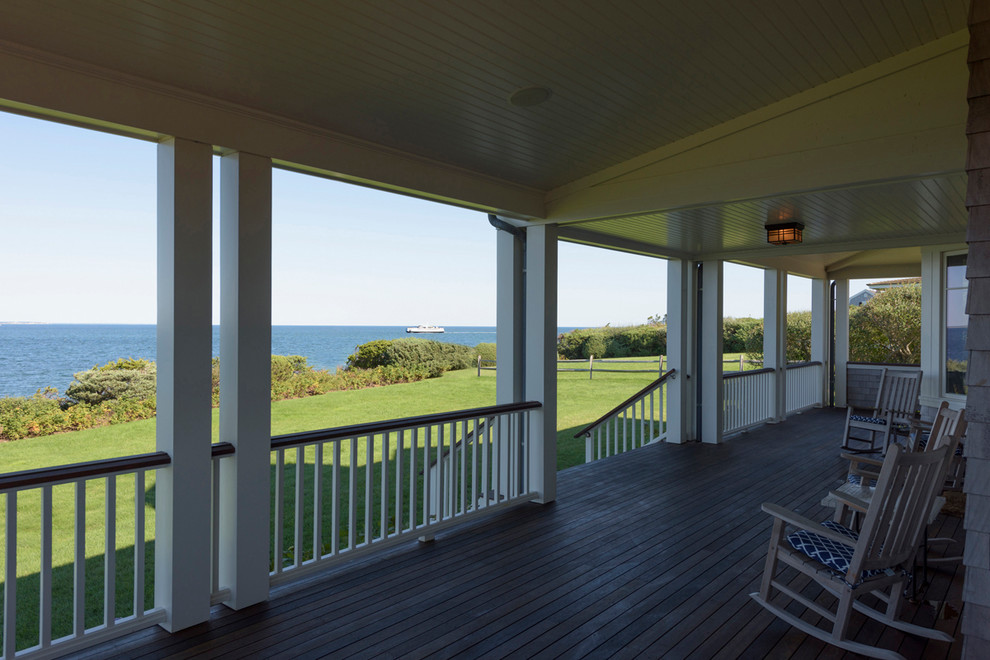 Photo of a large nautical back veranda in Boston with decking and a roof extension.