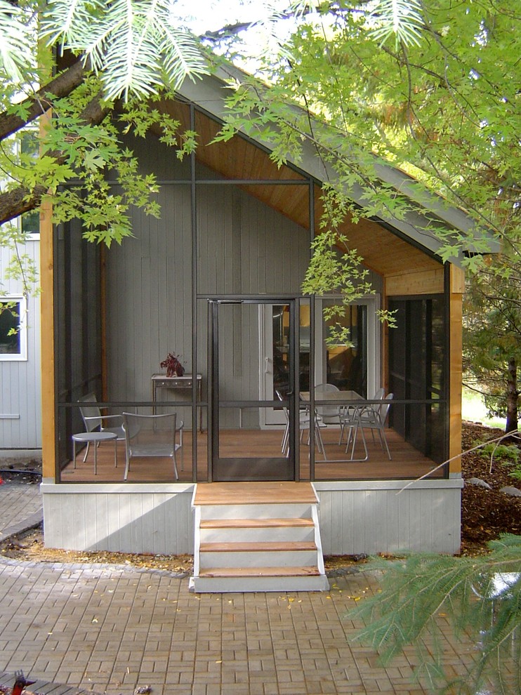 This is an example of a contemporary veranda in Minneapolis.