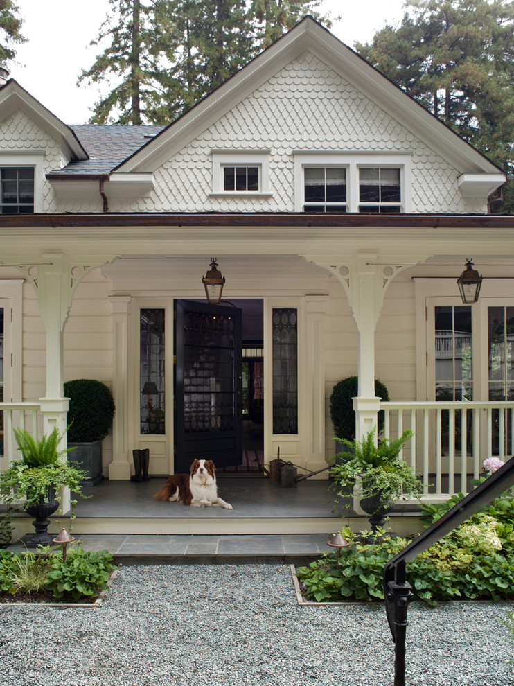 This is an example of a traditional front porch design in San Francisco with a roof extension.