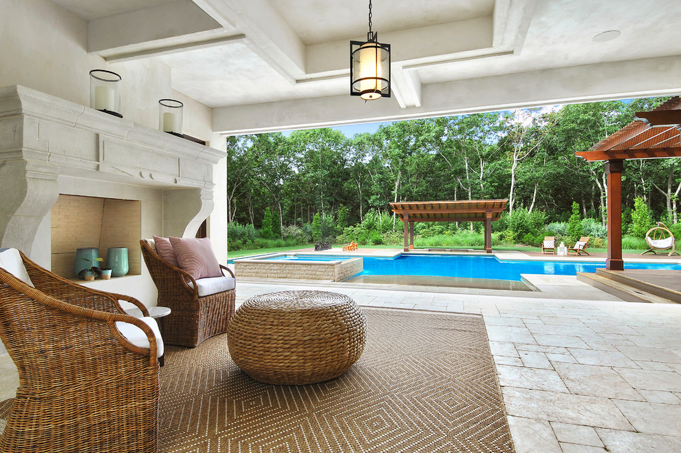 Diseño de terraza mediterránea grande en patio trasero y anexo de casas con brasero y adoquines de piedra natural