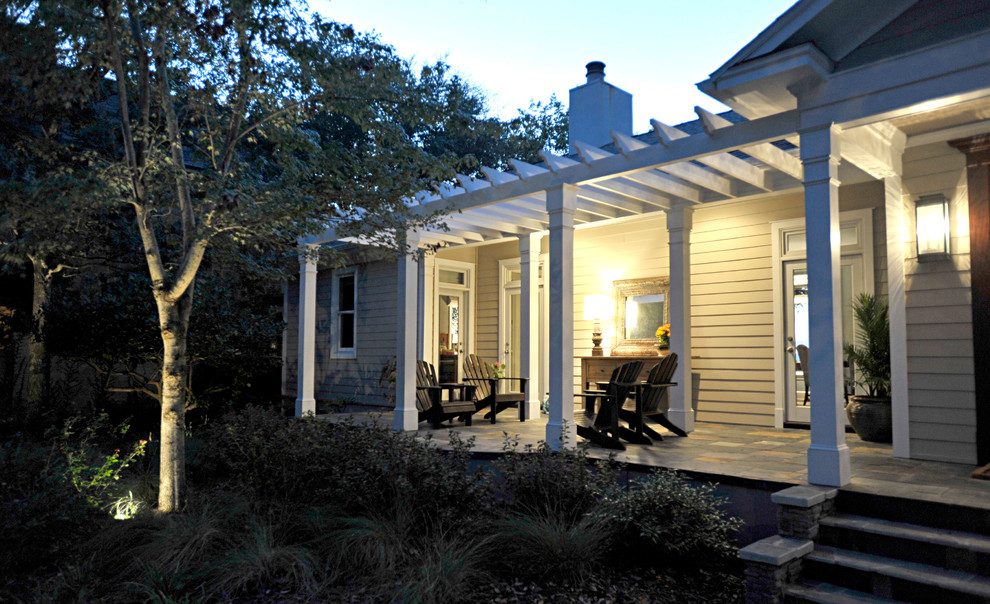 Inspiration for a timeless porch remodel in Miami with a pergola