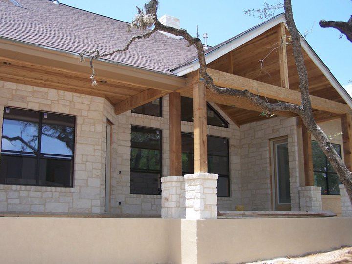 This is an example of a traditional porch design in Austin.