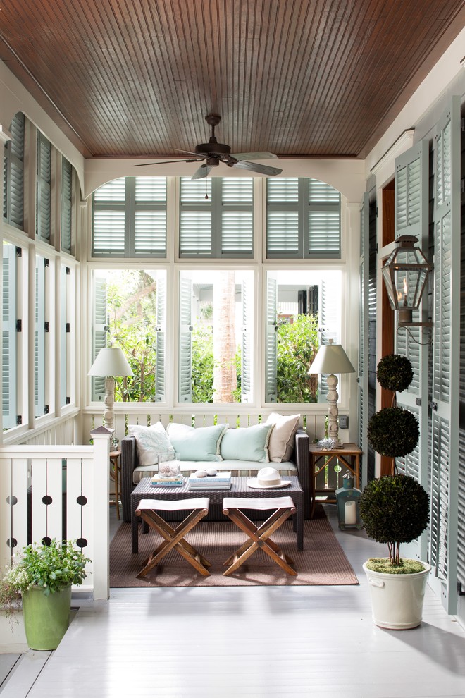 Inspiration for a mid-sized craftsman front porch remodel in Other with decking and a roof extension