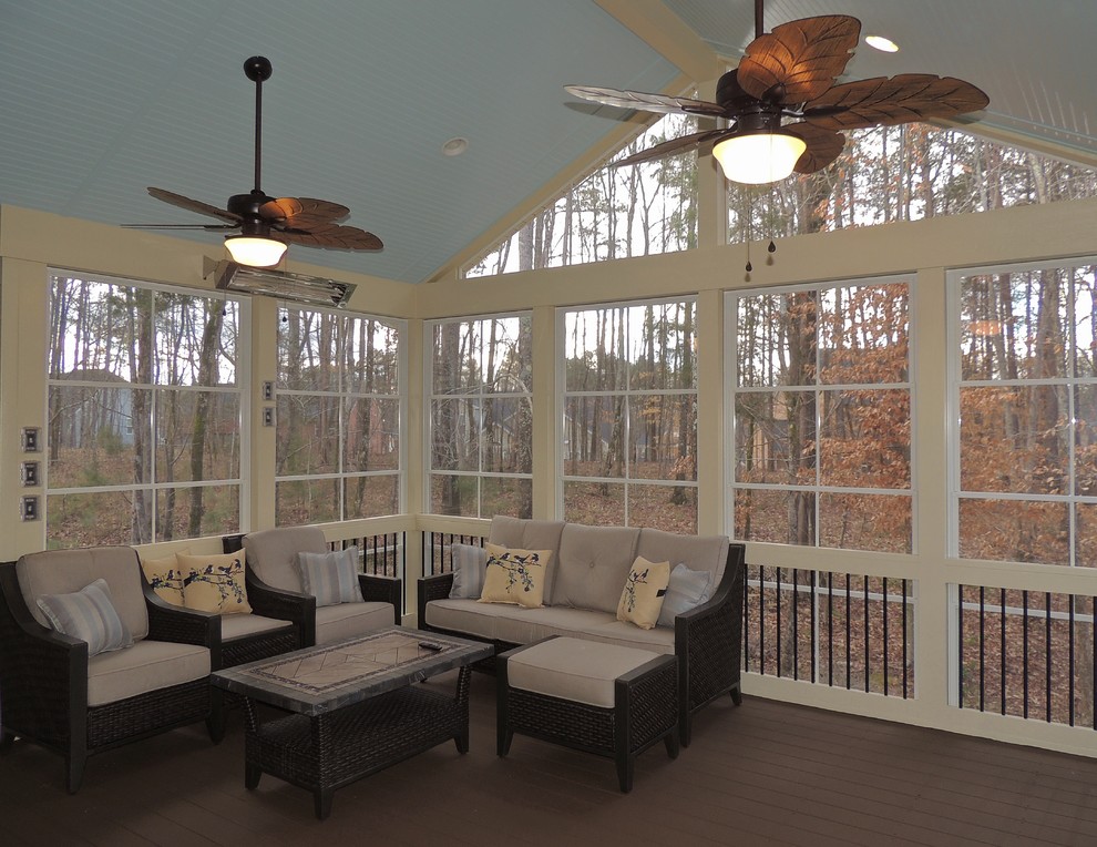 Design ideas for a large classic back screened veranda in Charlotte with decking and a roof extension.