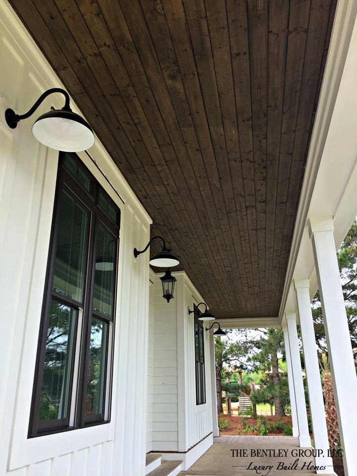 This is an example of a cottage porch design in Raleigh.