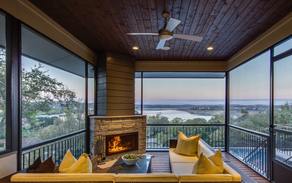 Medium sized contemporary back screened veranda in Austin with decking and a roof extension.