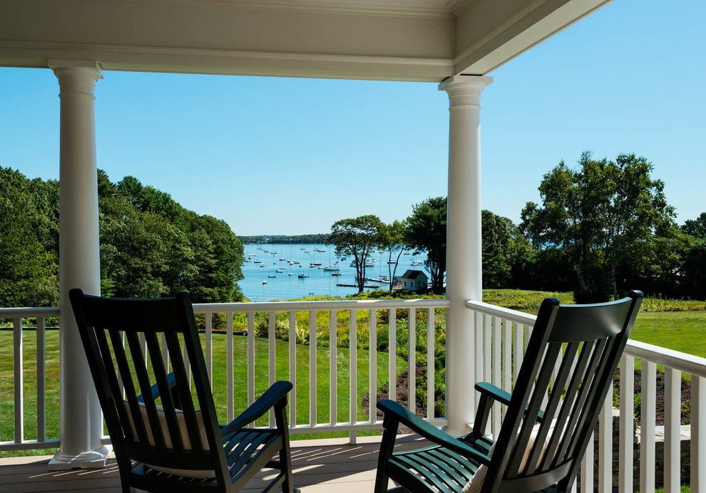 Photo of a nautical veranda in Portland Maine with decking and a roof extension.