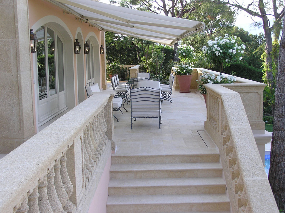 This is an example of a mediterranean porch design in Chicago.