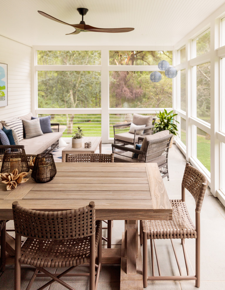 Country screened-in porch photo in Boston with a roof extension