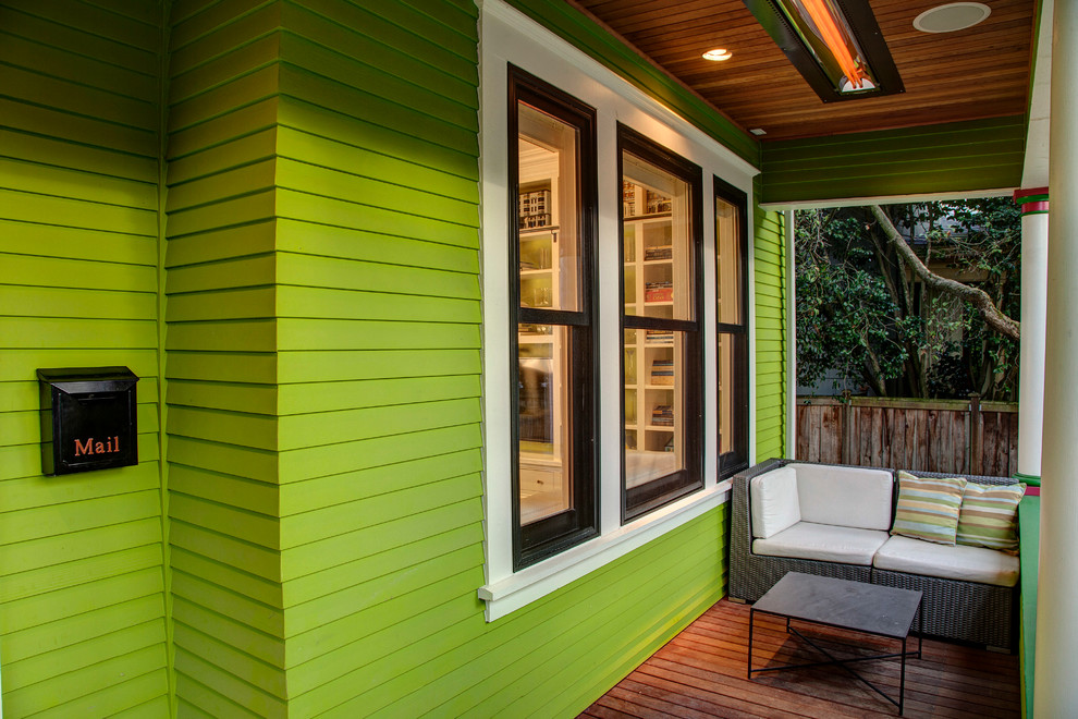 Inspiration for a traditional veranda in Seattle with a roof extension.