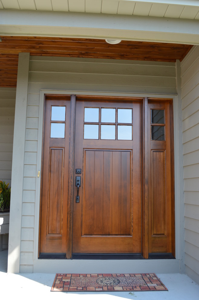 This is an example of a craftsman porch design in Minneapolis.