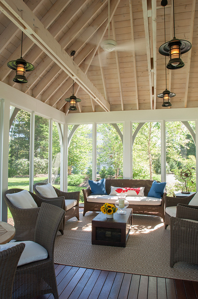 This is an example of a coastal porch design in Portland Maine with decking.