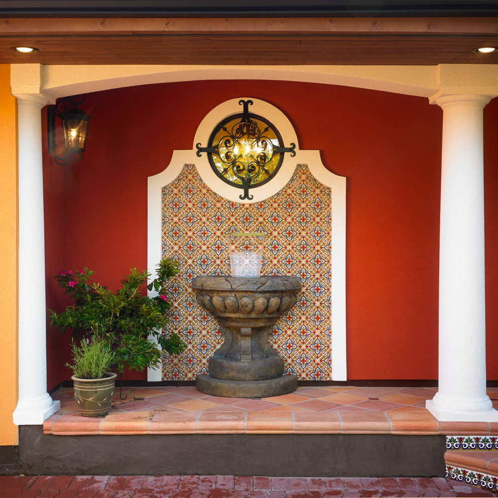 Exempel på en amerikansk veranda, med en fontän