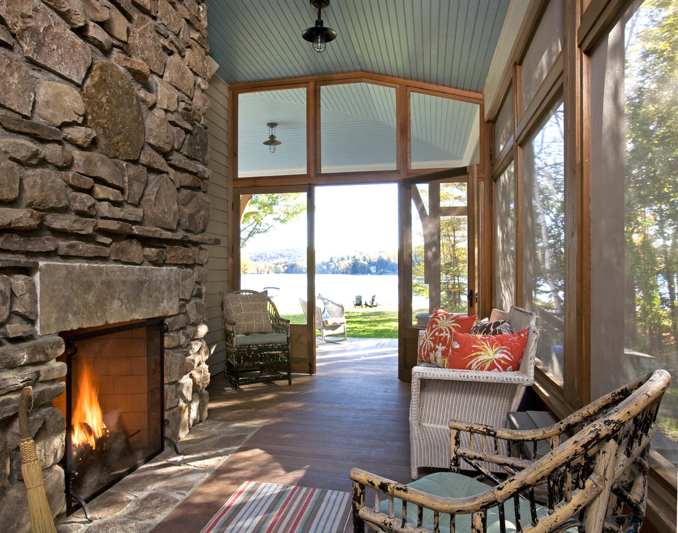 Design ideas for a classic veranda in Boston with a fire feature and all types of cover.
