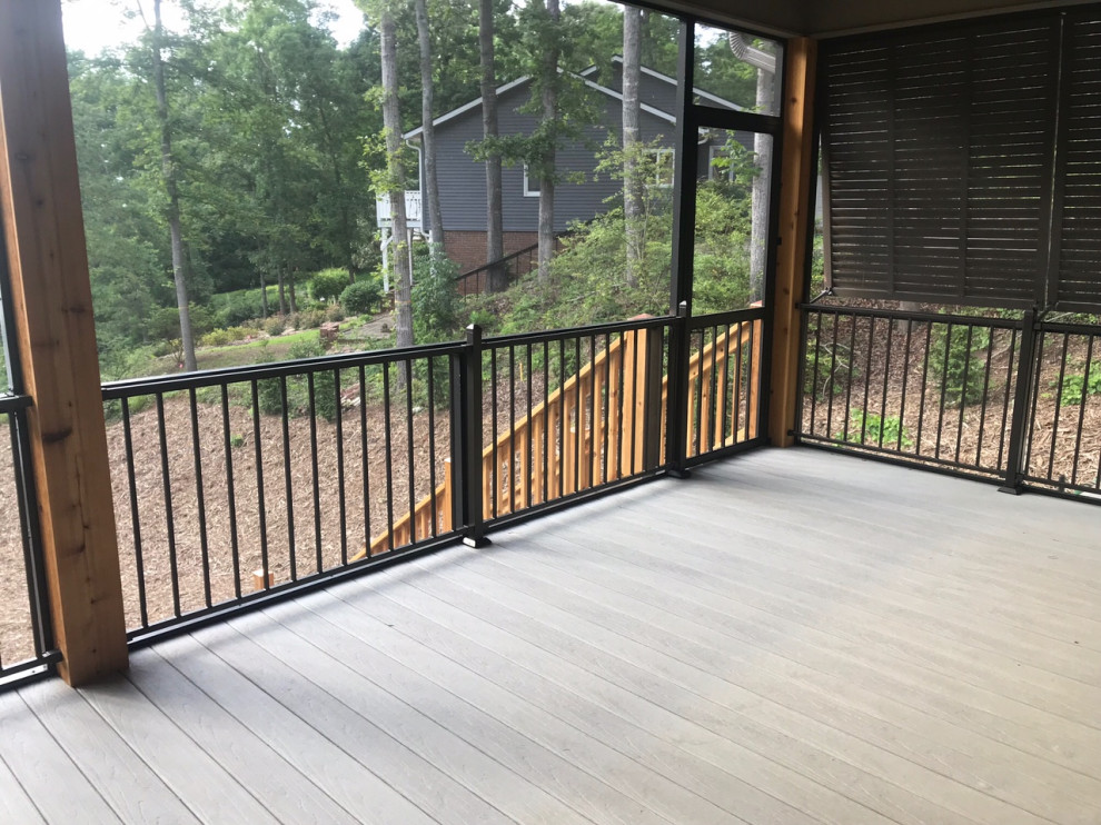 Medium sized classic back screened veranda in Other with decking.