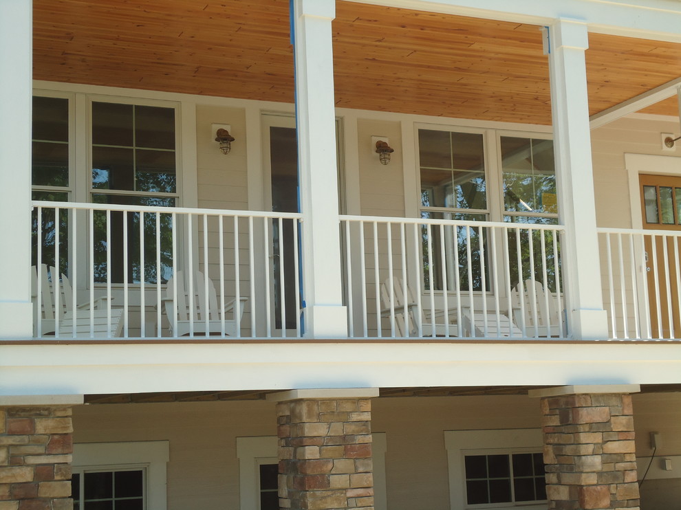 This is an example of a coastal porch design in Grand Rapids.