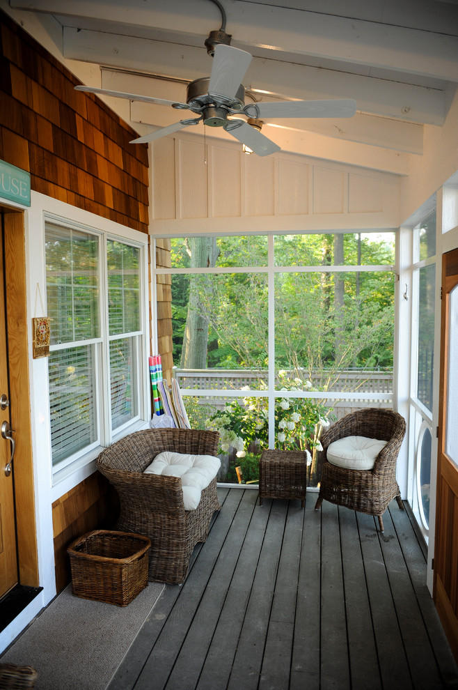 This is an example of a coastal porch design in Grand Rapids.