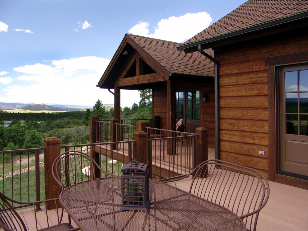 Inspiration for a timeless porch remodel in Denver with decking