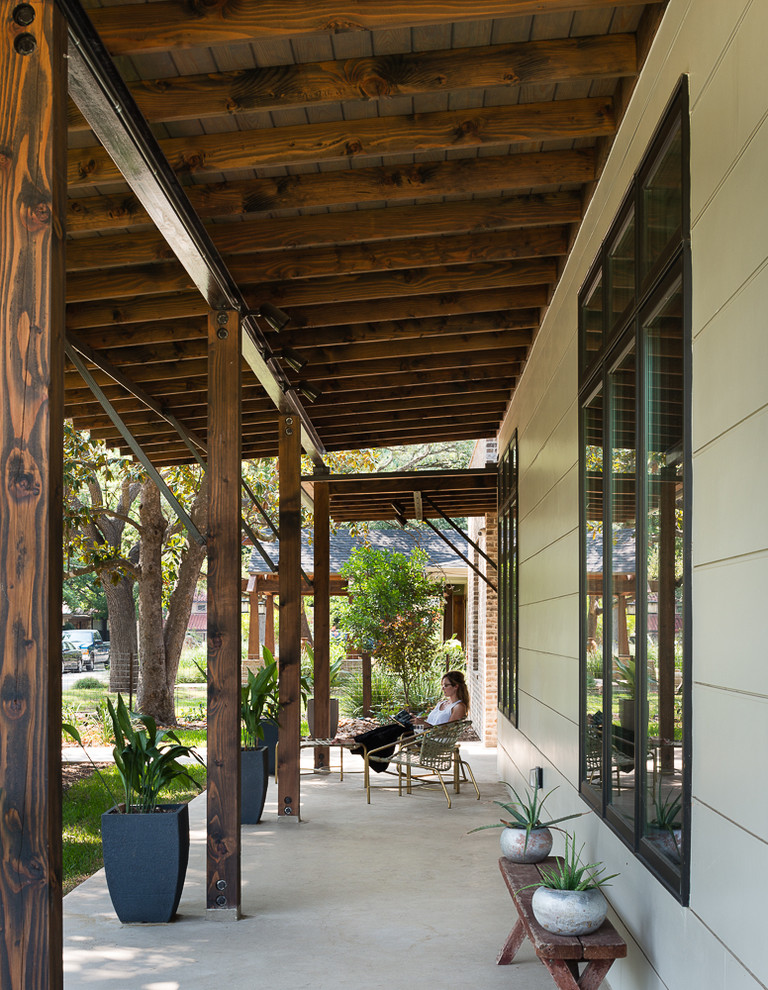 This is an example of a rustic veranda in Austin.