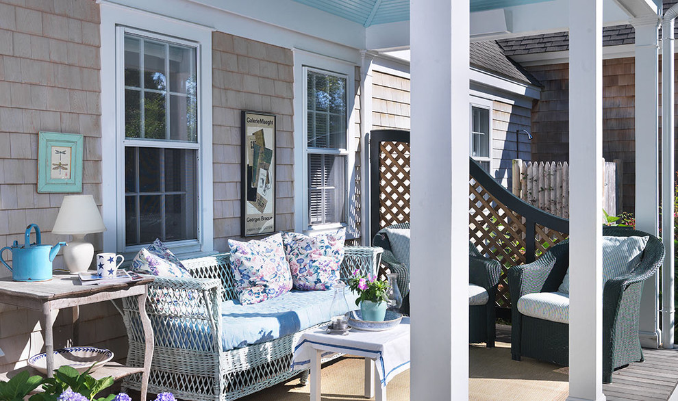 This is an example of a beach style veranda in Boston.