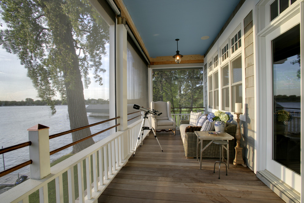 Beach style screened-in porch photo in Los Angeles with decking