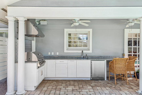Harmonizing Colors: Granite Countertops with White Cabinets Outdoors