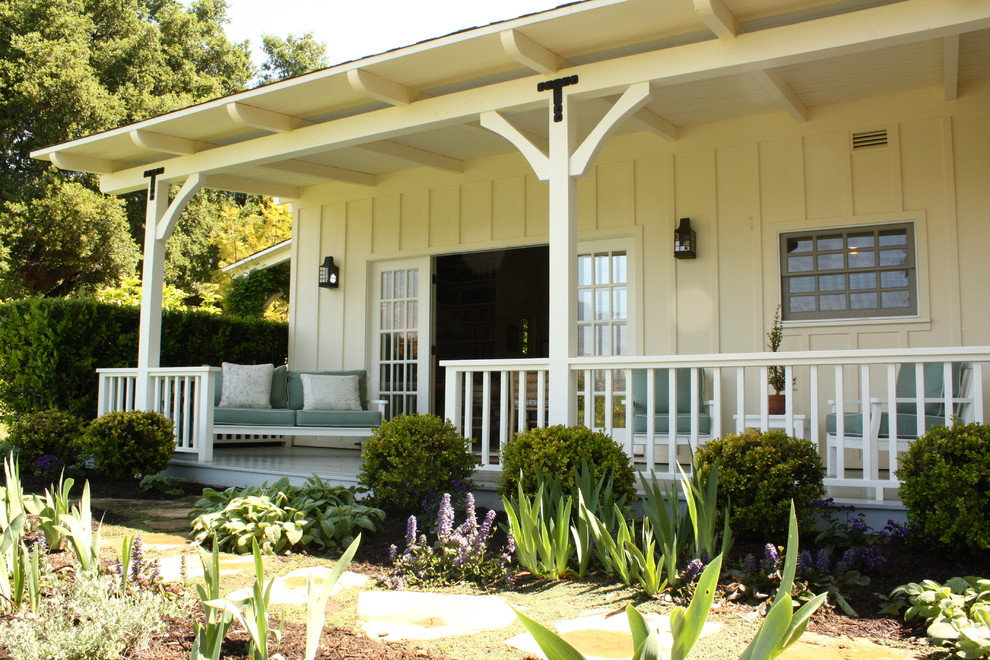 Cottage porch photo in Santa Barbara with decking and a roof extension