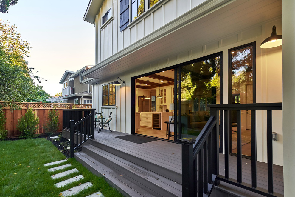 Mid-sized cottage porch photo in San Francisco with decking and a roof extension