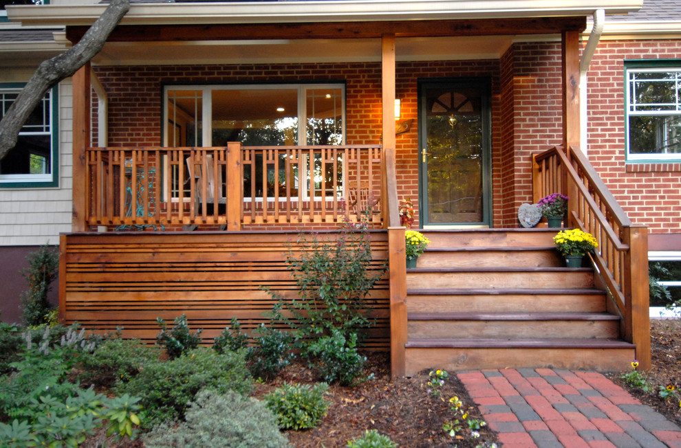 Foto di un piccolo portico american style davanti casa con un tetto a sbalzo