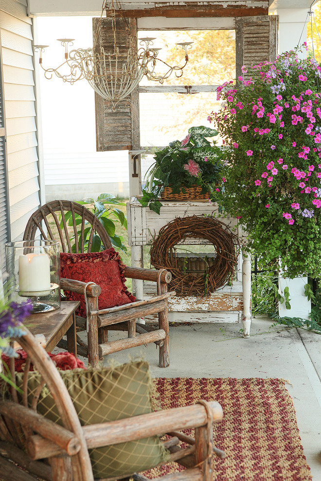 Exemple d'un porche d'entrée de maison romantique.