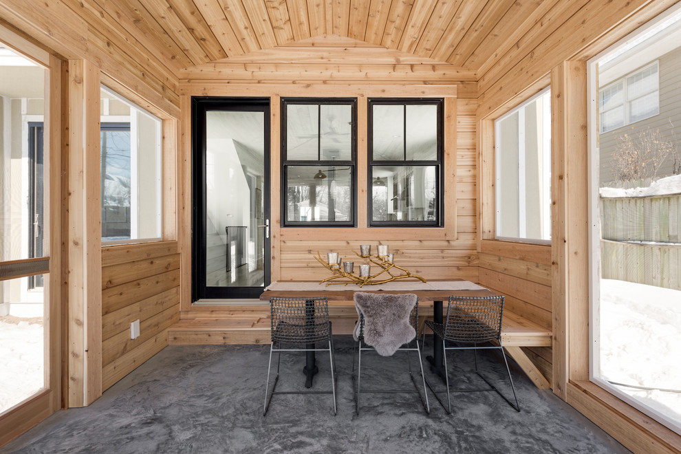 Idées déco pour un porche d'entrée de maison campagne avec une extension de toiture.