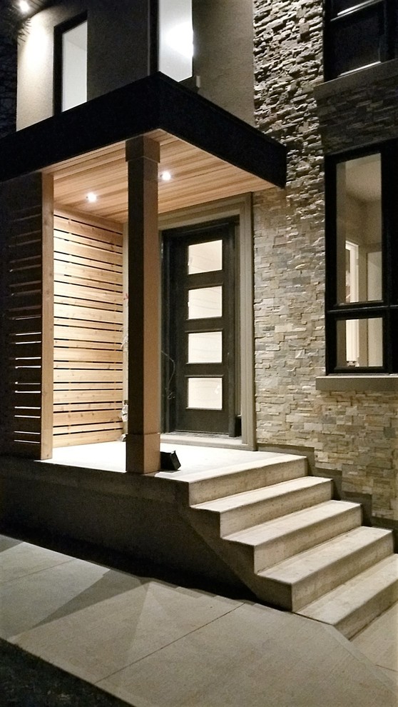 Источник вдохновения для домашнего уюта: веранда среднего размера на переднем дворе в стиле модернизм с колоннами, мощением тротуарной плиткой и козырьком