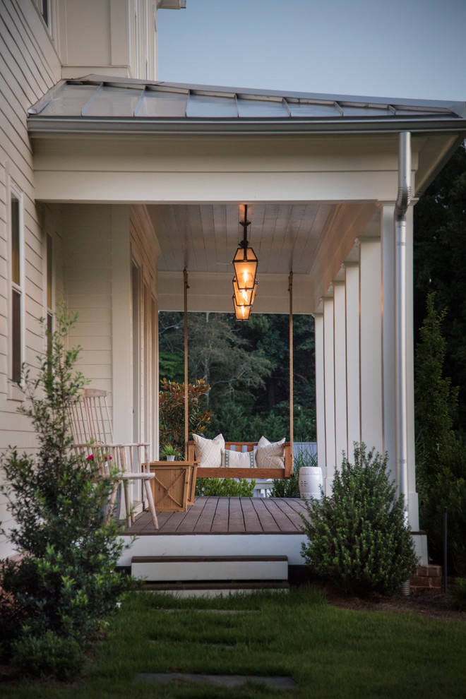 Inspiration for a rural veranda in Atlanta with feature lighting.