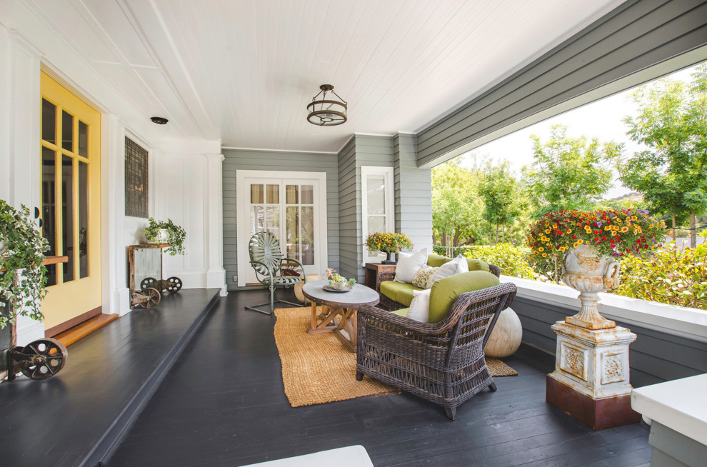 Photo of a classic veranda in San Luis Obispo with a potted garden and a roof extension.