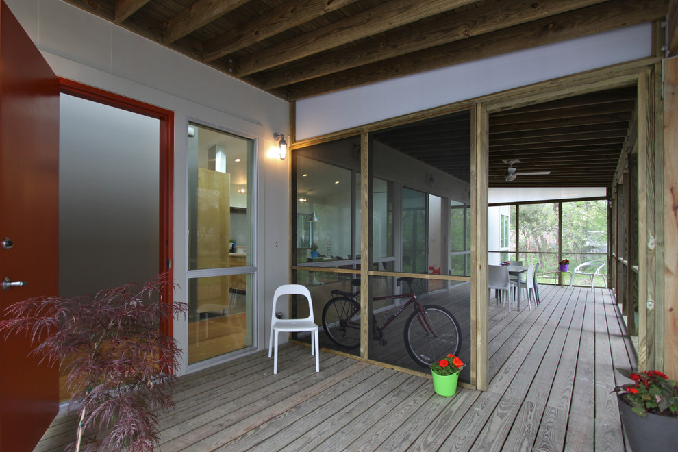 Idée de décoration pour un porche d'entrée de maison minimaliste.
