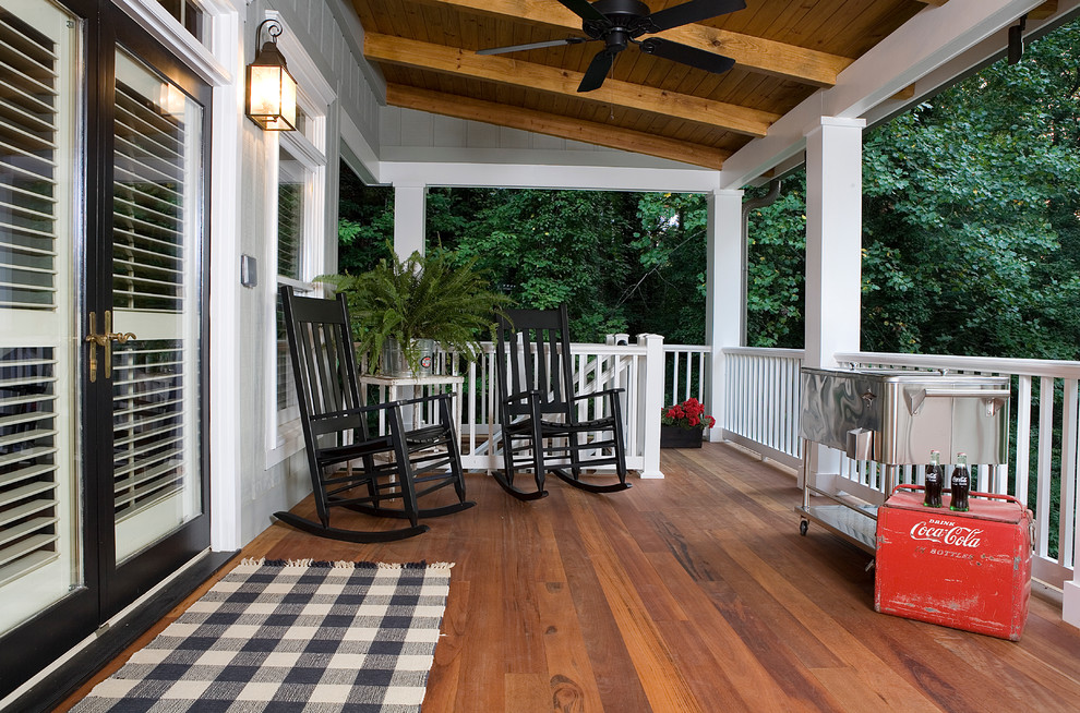 This is an example of a classic veranda in Atlanta with decking and a roof extension.