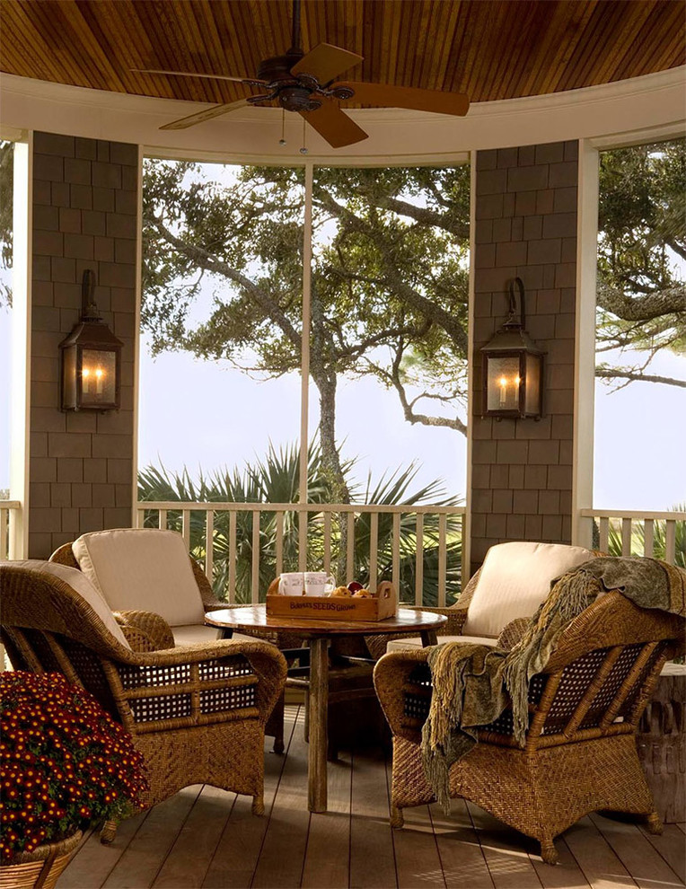 Design ideas for a coastal screened veranda in Charleston with decking, a roof extension and all types of cover.