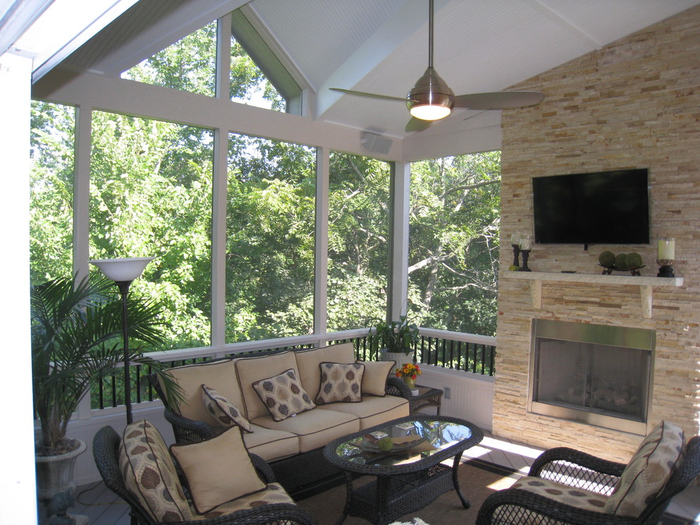 Olathe KS screened porch with beautiful outdoor fireplace Traditional