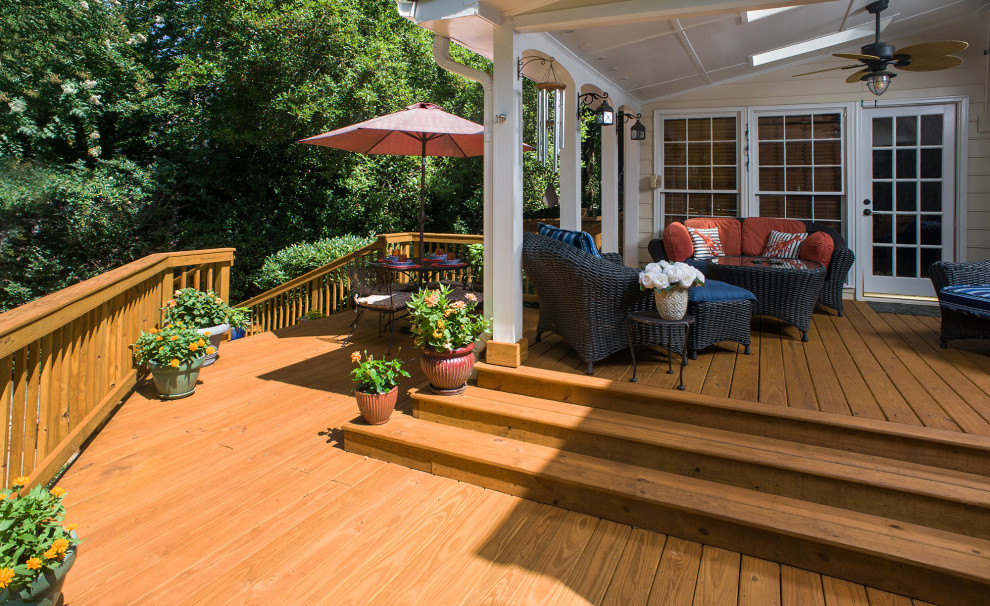Design ideas for a traditional back veranda in Atlanta with a roof extension.