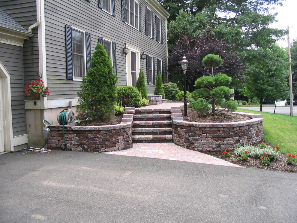 Mid-sized classic brick front porch idea in Bridgeport