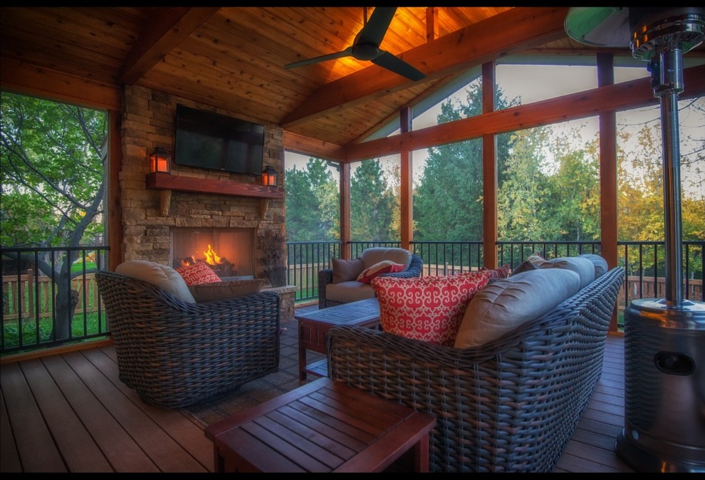 Outdoor Fireplace screened porch in Leawood KS Traditional Porch